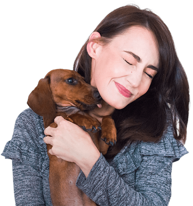 Woman holding a dog